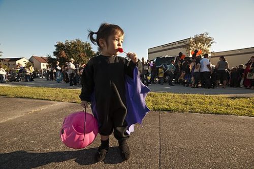Halloween-Trunk-Treat-Event-Child-eating-candy